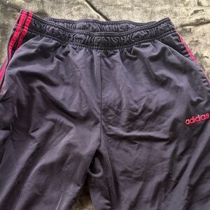 Adidas pants in Black with red stripes